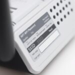 Naklejka na routerze z hasłem do WiFi i kluczem sieciowym